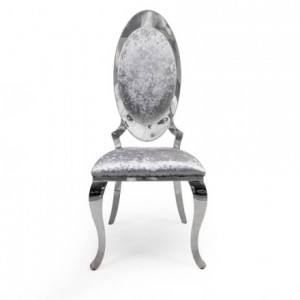 Silla de diseño elegante ISABEL II con inspiración isabelina, acabado cromado y tapizada en terciopelo gris.